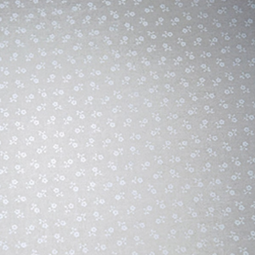 Tissu faux uni - Ton sur ton blanc petites fleurs