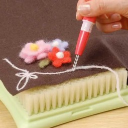 Porte aiguilles pour feutrage