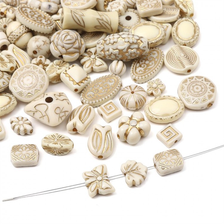 Perles mix gravées x20g