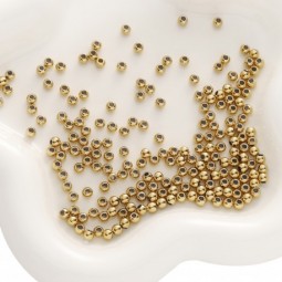 Perles ronde en métal doré