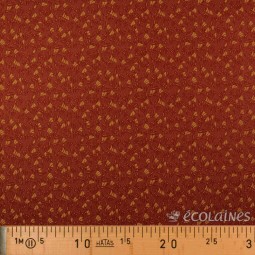 Tissu Eclats jaune sur fond brique