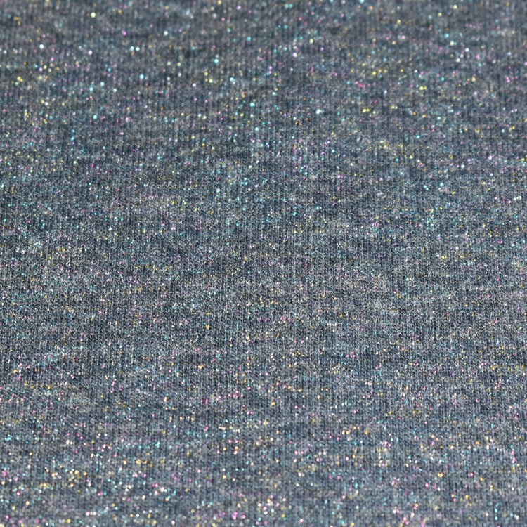 Tissu jersey sweat - bleu à paillettes multicolores