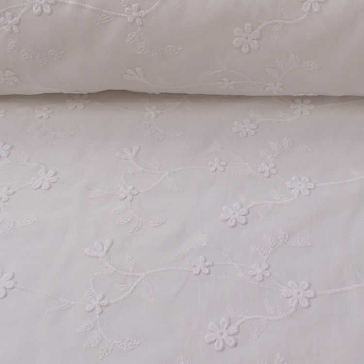 Tissu Broderie anglaise - pâquerettes en relief