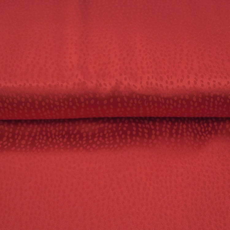 Tissu polyester - Flocons Satin Rouge