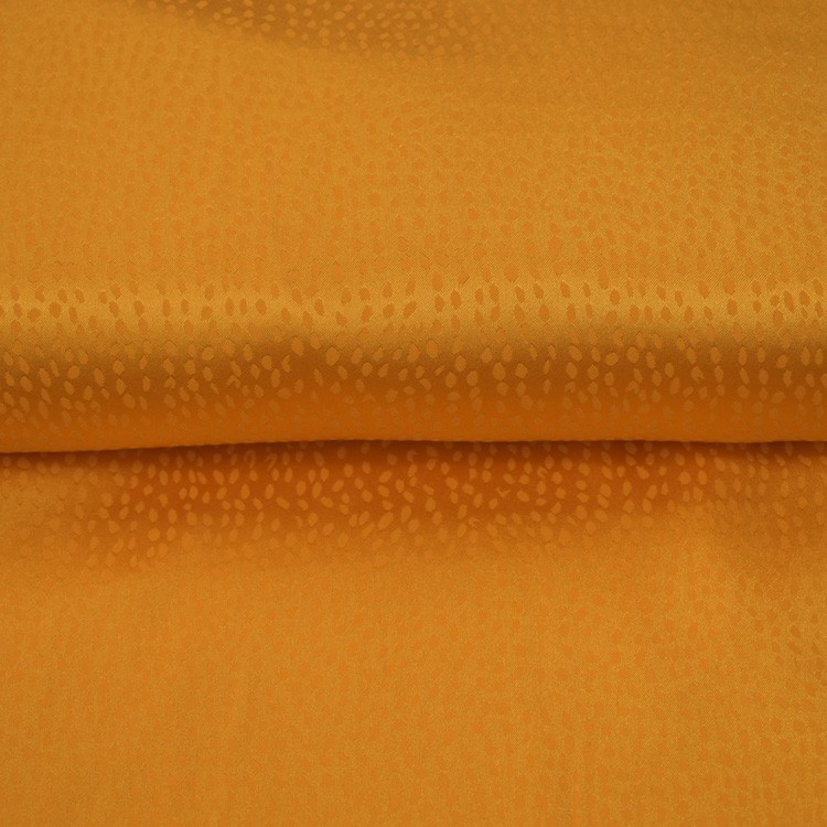 Tissu polyester - Flocons jaune ocre