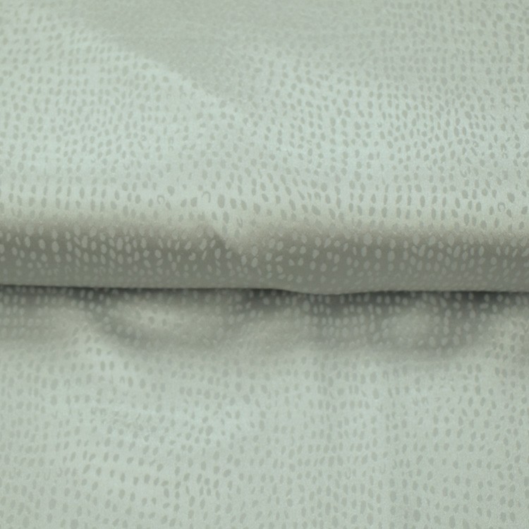 Tissu polyester - Flocons gris argenté
