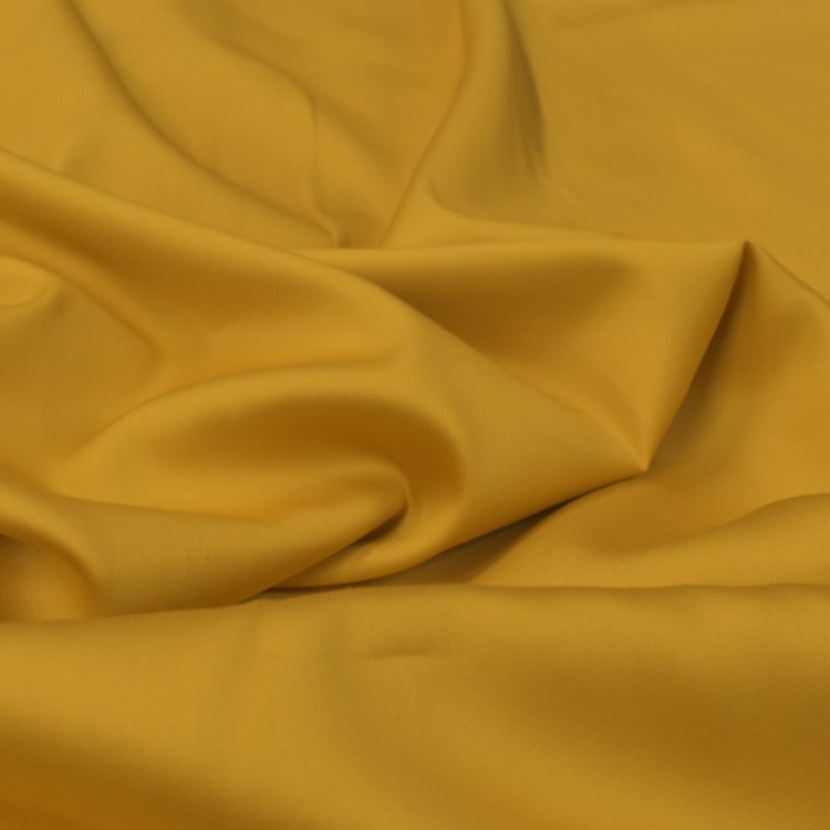 Tissu coton uni satiné jaune