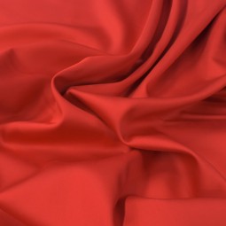 Tissu coton uni satiné rouge vif